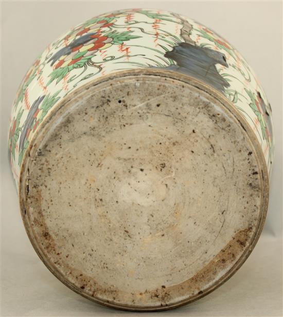 A Chinese wucai baluster jar, 17th century, 32cm., broken and restored